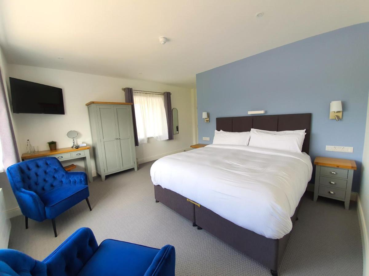 Dingle Garden Townhouse Exterior foto A bedroom at The Old Mill